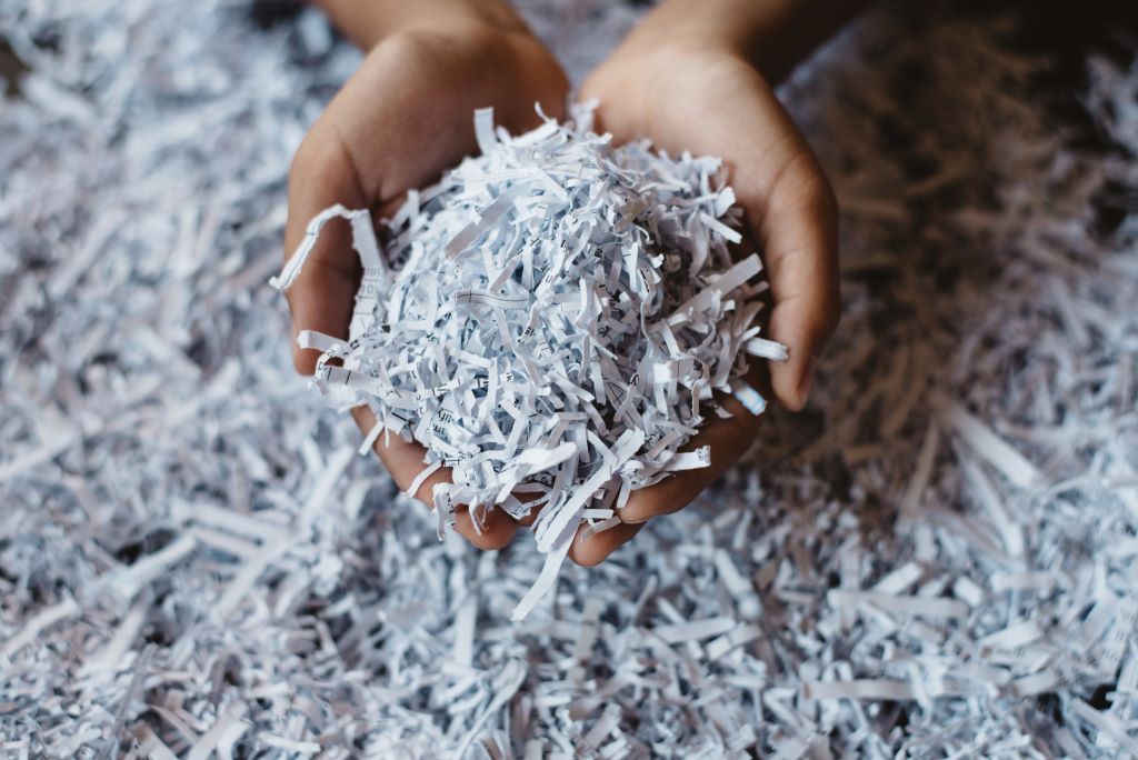 picture of finely shredded paper cupped in a hand